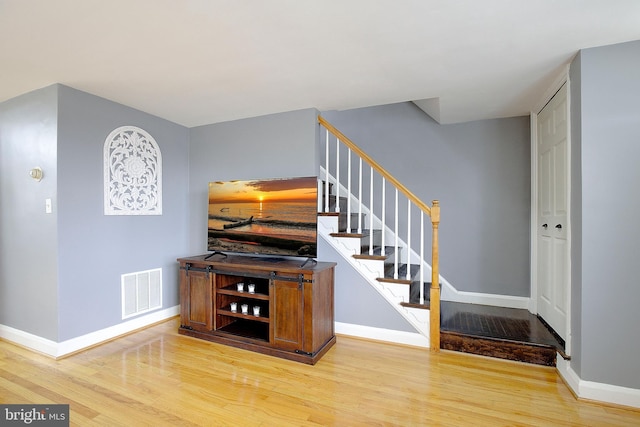 interior space with hardwood / wood-style floors