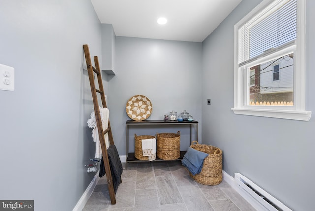 sitting room with a baseboard radiator