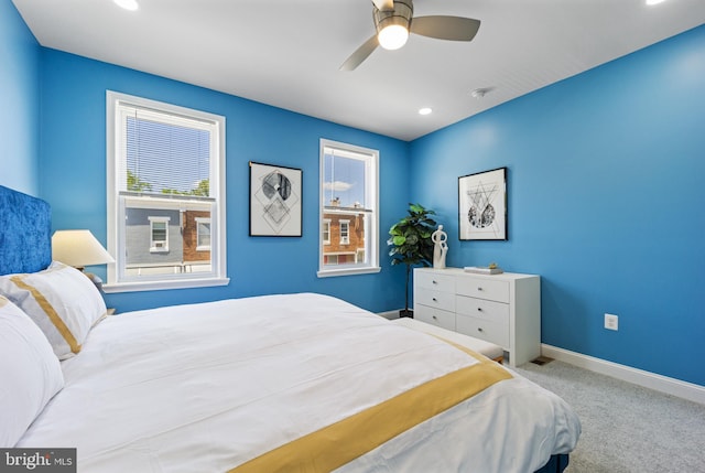 carpeted bedroom featuring ceiling fan