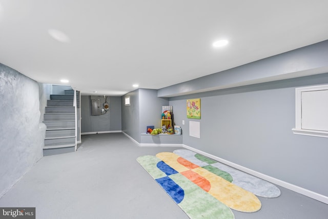 playroom with concrete flooring