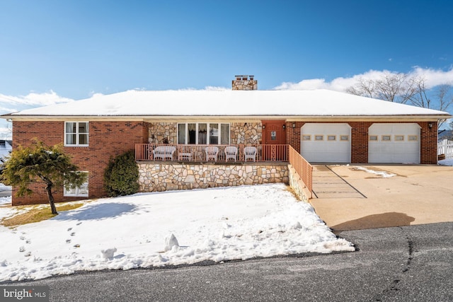 single story home with a garage