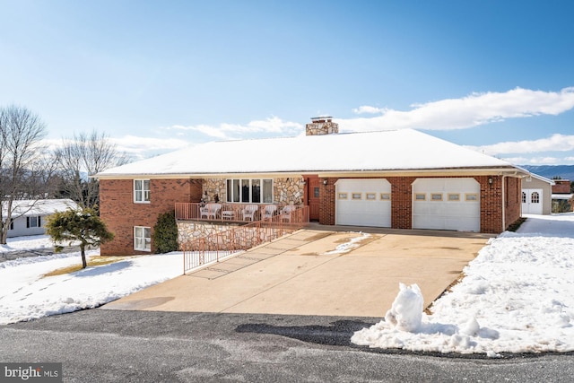 ranch-style home featuring a garage