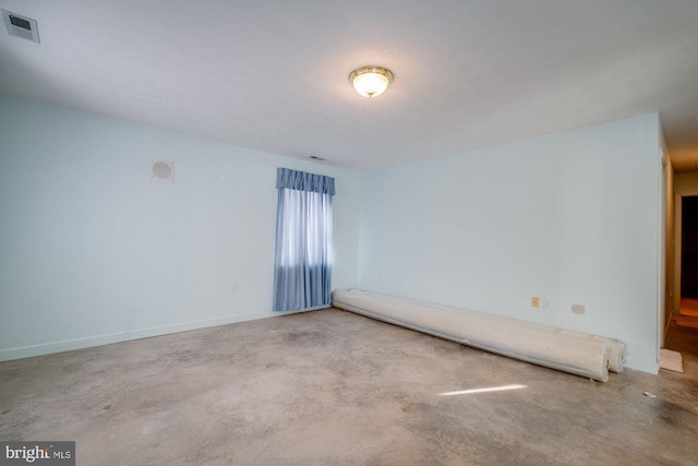 empty room with concrete floors