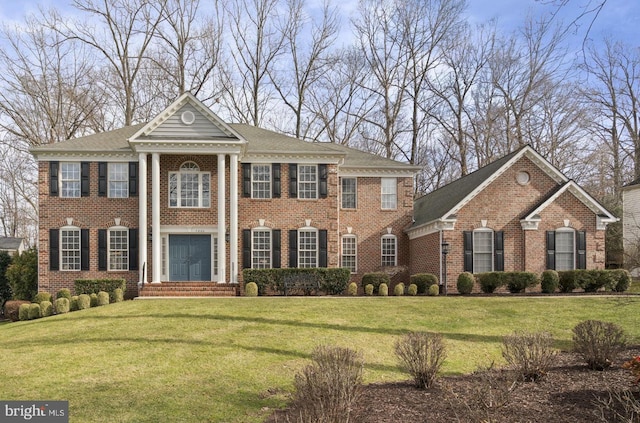 view of front of home with a front yard