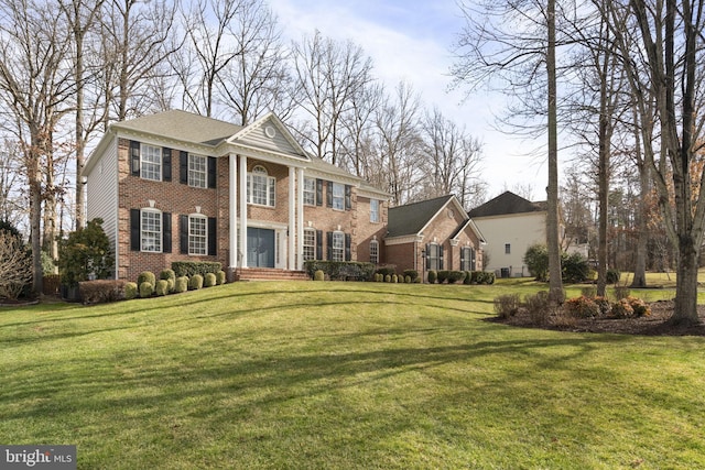 view of front of house with a front lawn