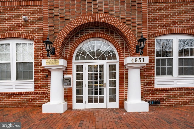 property entrance featuring french doors