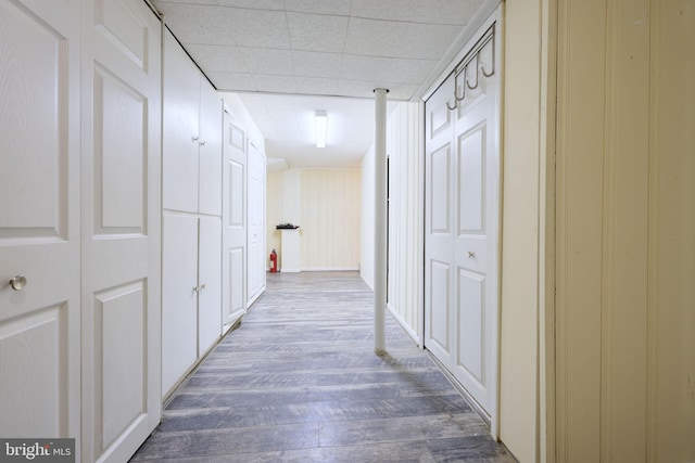 hallway featuring dark hardwood / wood-style floors