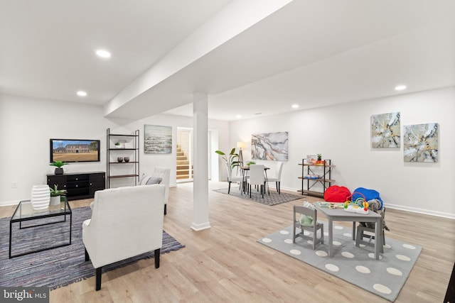 interior space featuring light wood-style floors, recessed lighting, and baseboards