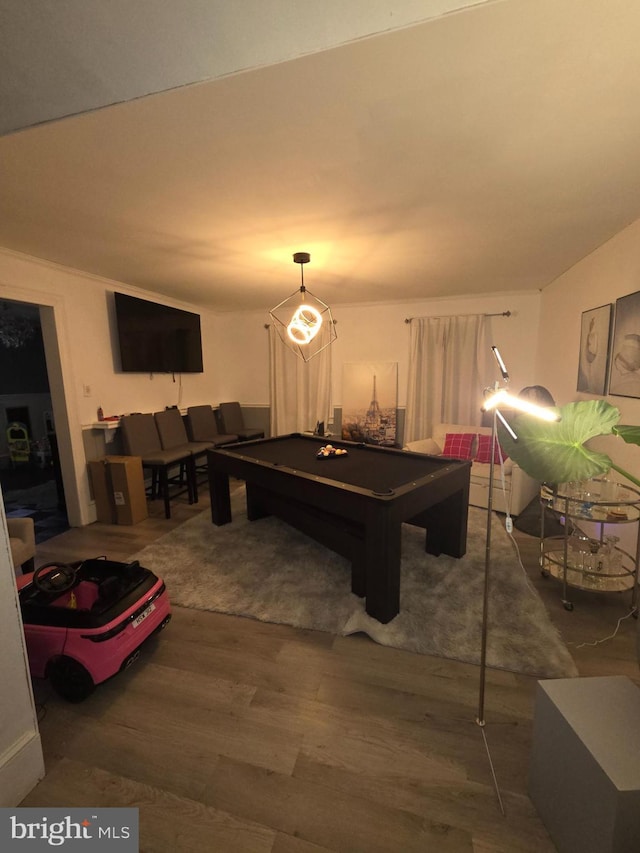 recreation room with pool table and dark hardwood / wood-style flooring