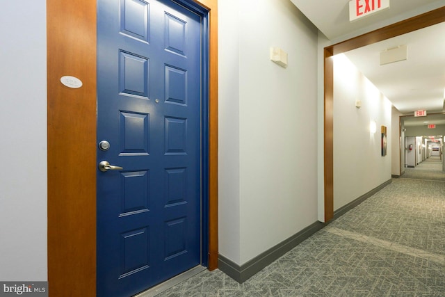 view of carpeted foyer