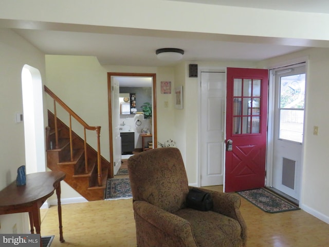 foyer entrance featuring hardwood / wood-style flooring