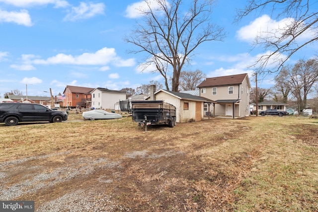 view of yard with a residential view