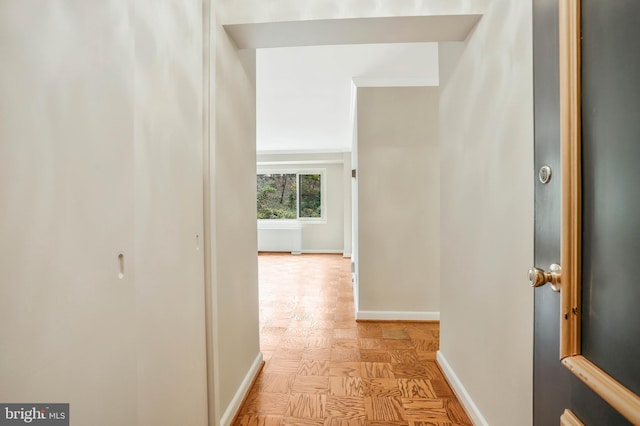 hallway with light parquet floors