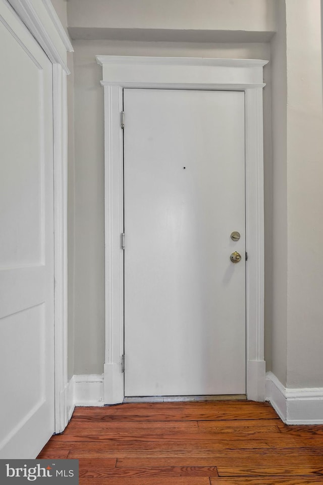 doorway featuring hardwood / wood-style floors