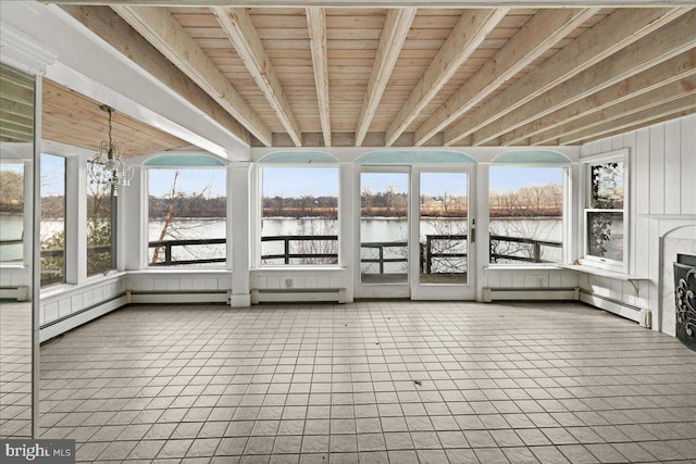 unfurnished sunroom featuring a notable chandelier, a water view, and a baseboard radiator