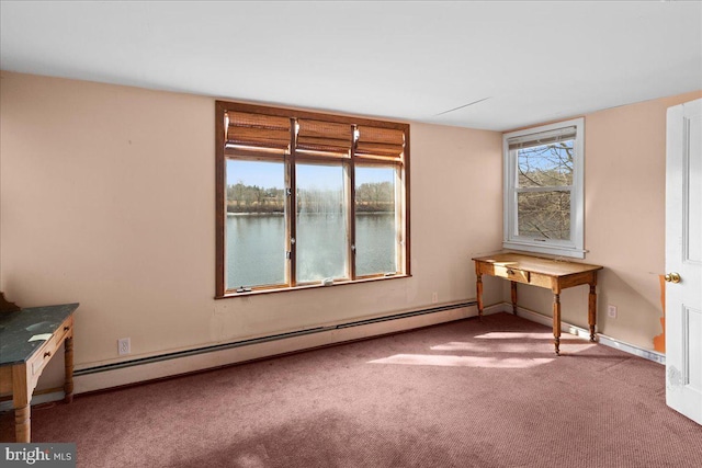 interior space with baseboard heating, carpet flooring, and a water view