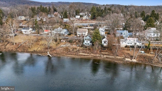 drone / aerial view featuring a water view