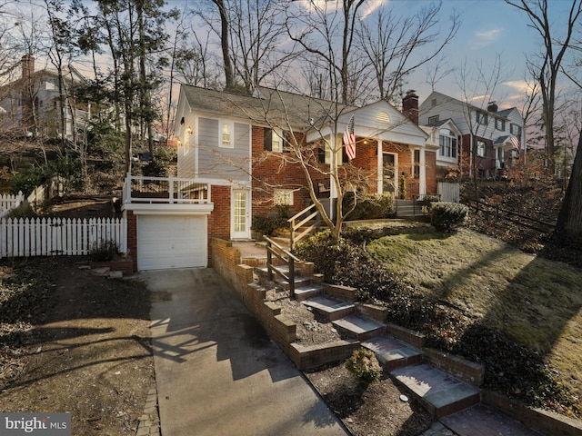 view of front of property with a garage