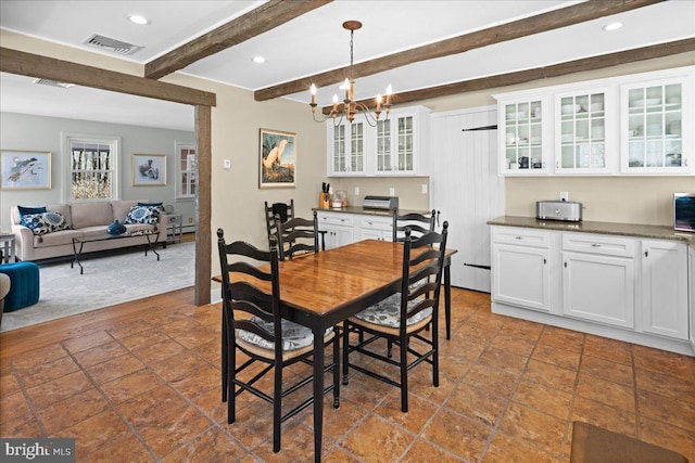 dining room with a chandelier, recessed lighting, beam ceiling, and visible vents