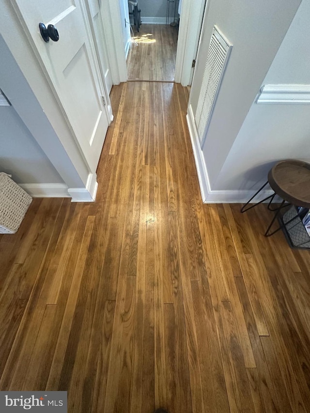 room details with wood finished floors and baseboards