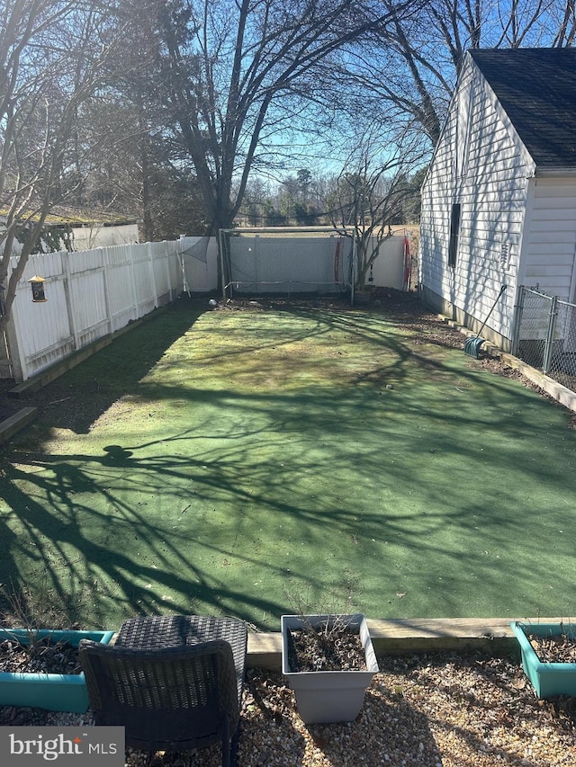 view of yard featuring a fenced backyard