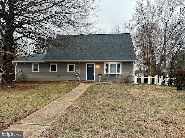 view of front of property with a front lawn