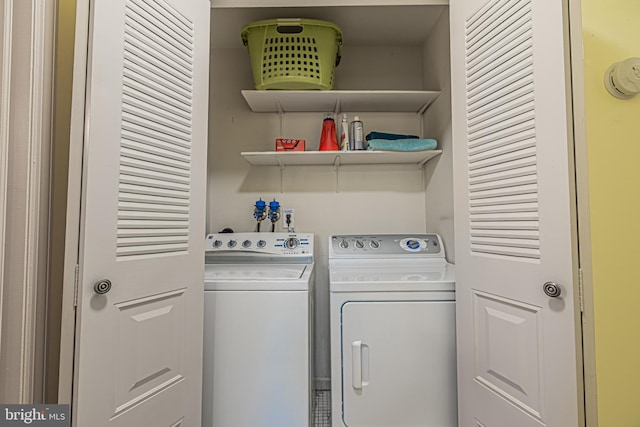 laundry area with washer and clothes dryer