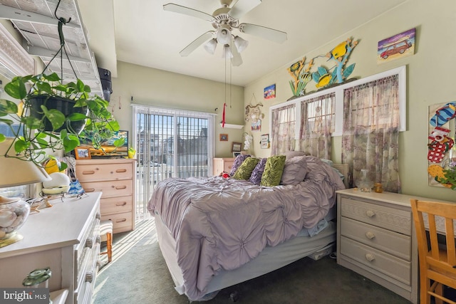 carpeted bedroom with access to outside and ceiling fan