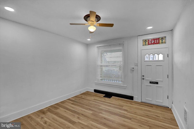 entryway featuring ceiling fan and light wood-type flooring