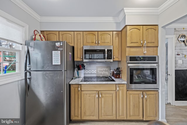 kitchen featuring light stone countertops, tasteful backsplash, appliances with stainless steel finishes, and crown molding