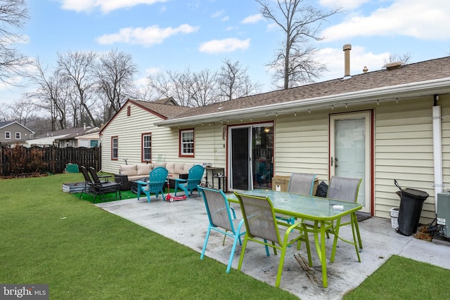 rear view of property featuring a lawn, a patio, roof with shingles, fence, and an outdoor living space