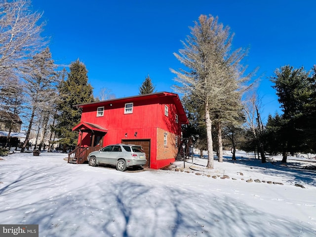 view of snow covered property