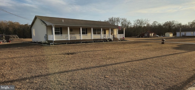 view of front of home featuring covered porch