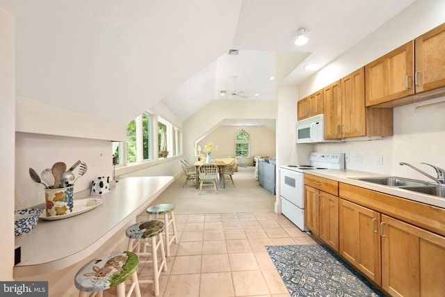 26372 Westerly Rd, Easton, MD 21601 - kitchen with white appliances, a sink, open floor plan, light carpet, and ceiling fan