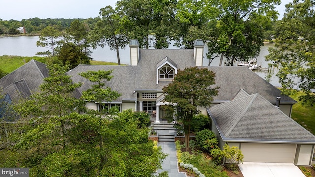 26372 Westerly Rd, Easton, MD 21601 - view of front of home with a chimney, roof with shingles, driveway, and a water view
