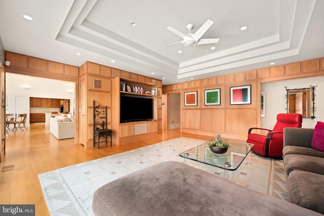 26372 Westerly Rd, Easton, MD 21601 - living room with a raised ceiling, wood finished floors, a ceiling fan, and wooden walls