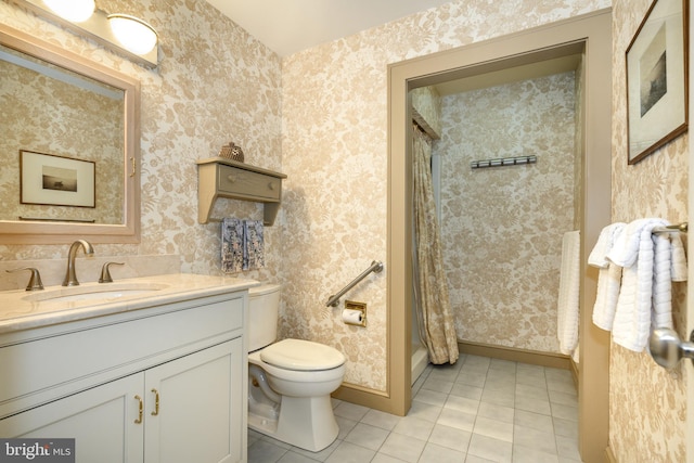 26372 Westerly Rd, Easton, MD 21601 - bathroom with tile patterned floors, toilet, vanity, a shower with curtain, and baseboards