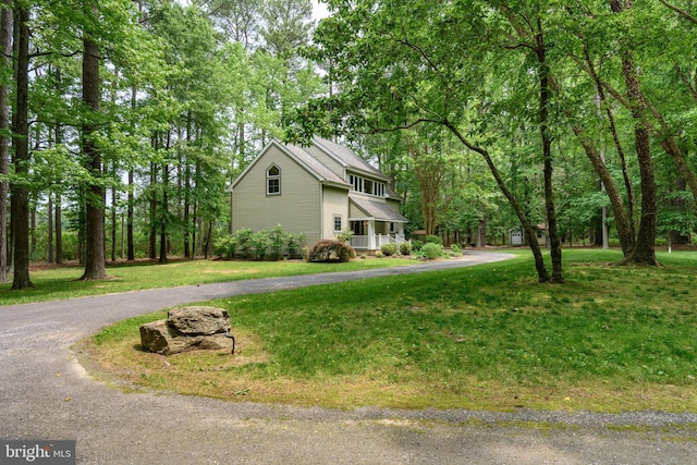 26372 Westerly Rd, Easton, MD 21601 - view of home's exterior featuring curved driveway and a yard
