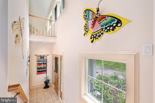26372 Westerly Rd, Easton, MD 21601 - hallway with plenty of natural light, tile patterned flooring, and baseboards