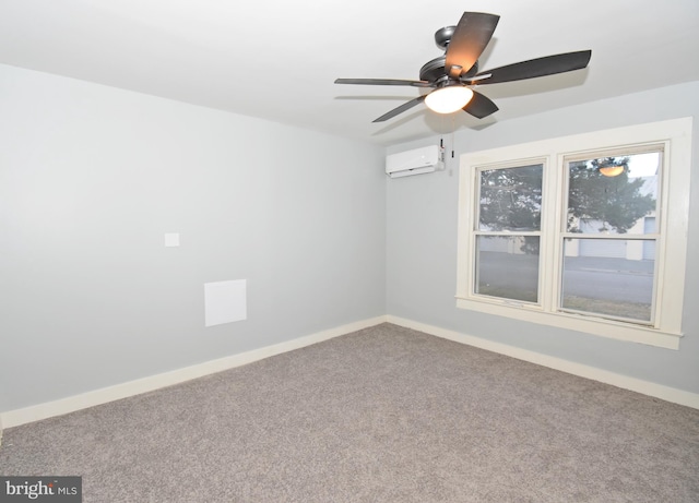 carpeted empty room featuring ceiling fan and a wall mounted AC