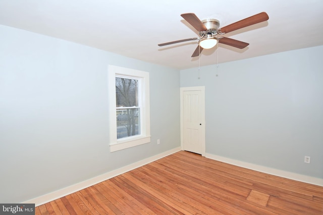 empty room with light hardwood / wood-style floors and ceiling fan