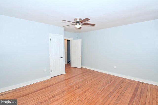 unfurnished room with light hardwood / wood-style floors and ceiling fan