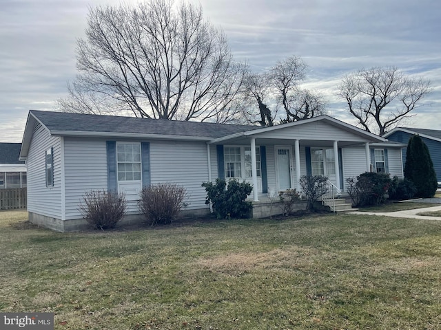 single story home featuring a porch and a front lawn