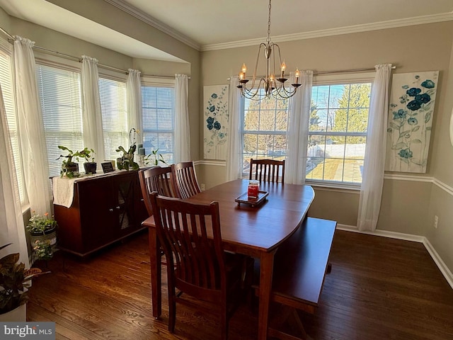 dining room featuring crown molding, dark hardwood / wood-style floors, and a chandelier