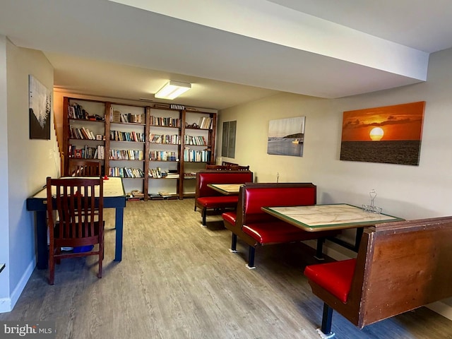 sitting room with hardwood / wood-style flooring