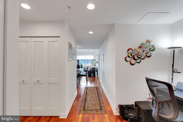 corridor featuring light hardwood / wood-style flooring