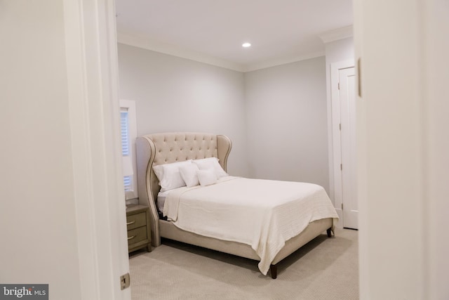 bedroom featuring recessed lighting, light colored carpet, and ornamental molding