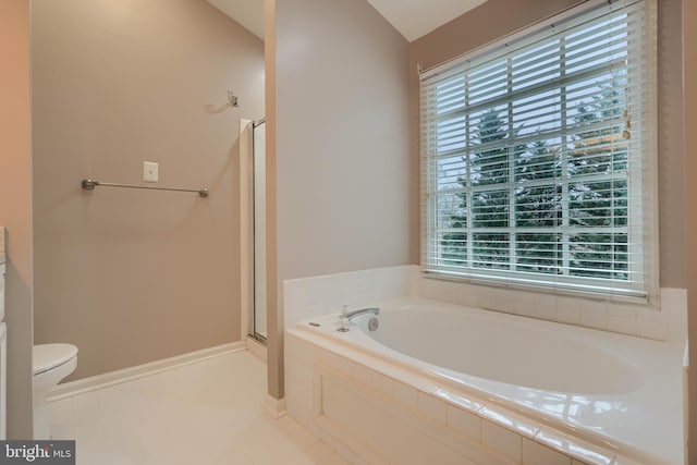 bathroom with tile patterned flooring, independent shower and bath, a healthy amount of sunlight, and toilet