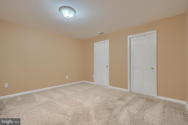 unfurnished bedroom with carpet