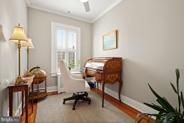 office with a ceiling fan, baseboards, ornamental molding, and wood finished floors